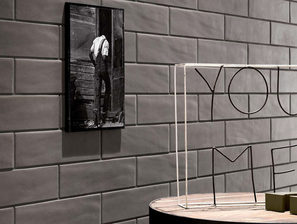 Cemento Boston porcelain on walls behind picture