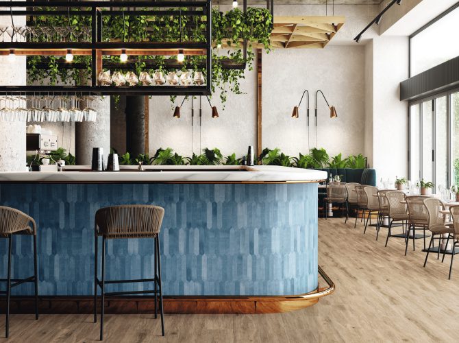 Switch ceramic tile in dark blue on a bar surround in a restaurant.