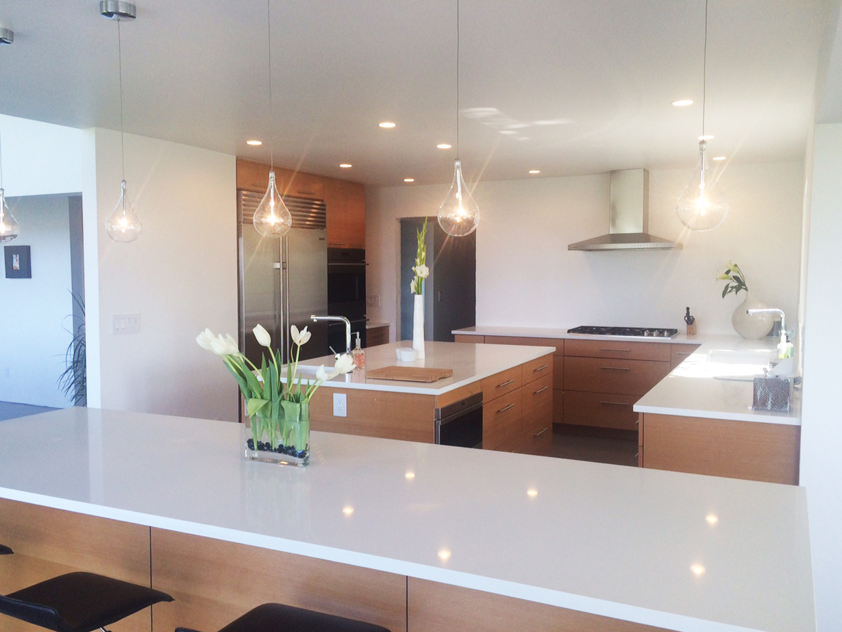 PentalQuartz Seashell featured on countertops is a modern kitchen.