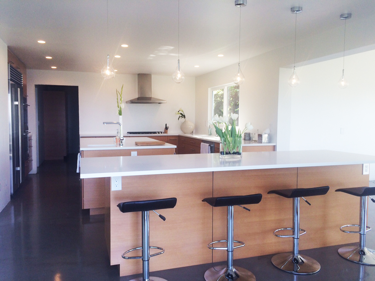 PentalQuartz Seashell featured on countertops is a modern kitchen.