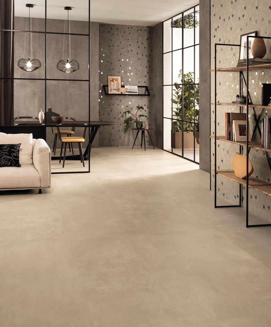 Boost Pro porcelain tile in cream and taupe hex mosaic on feature wall in living area.
