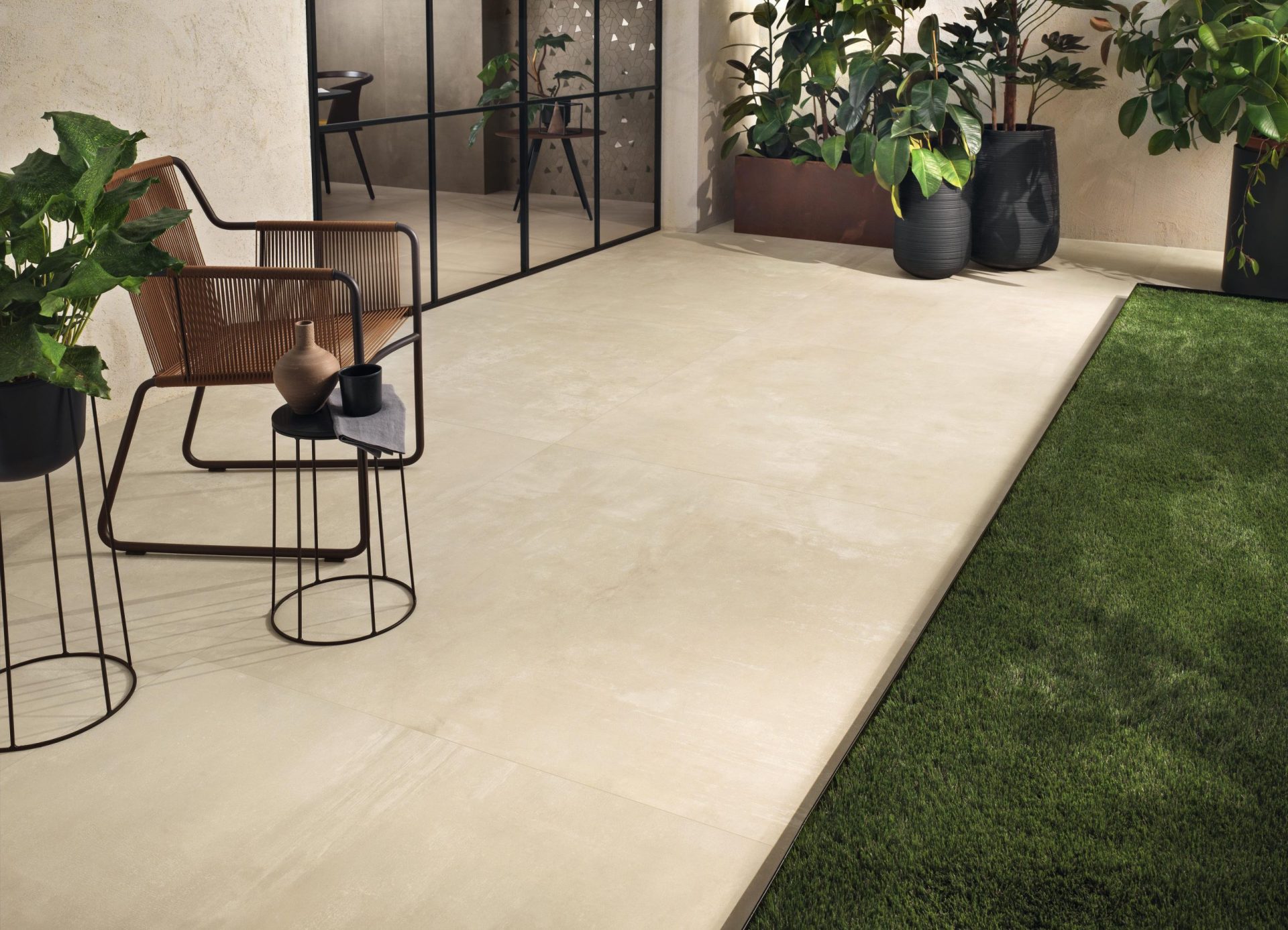 Ivory Boost Pro porcelain tile on floor in outdoor space.