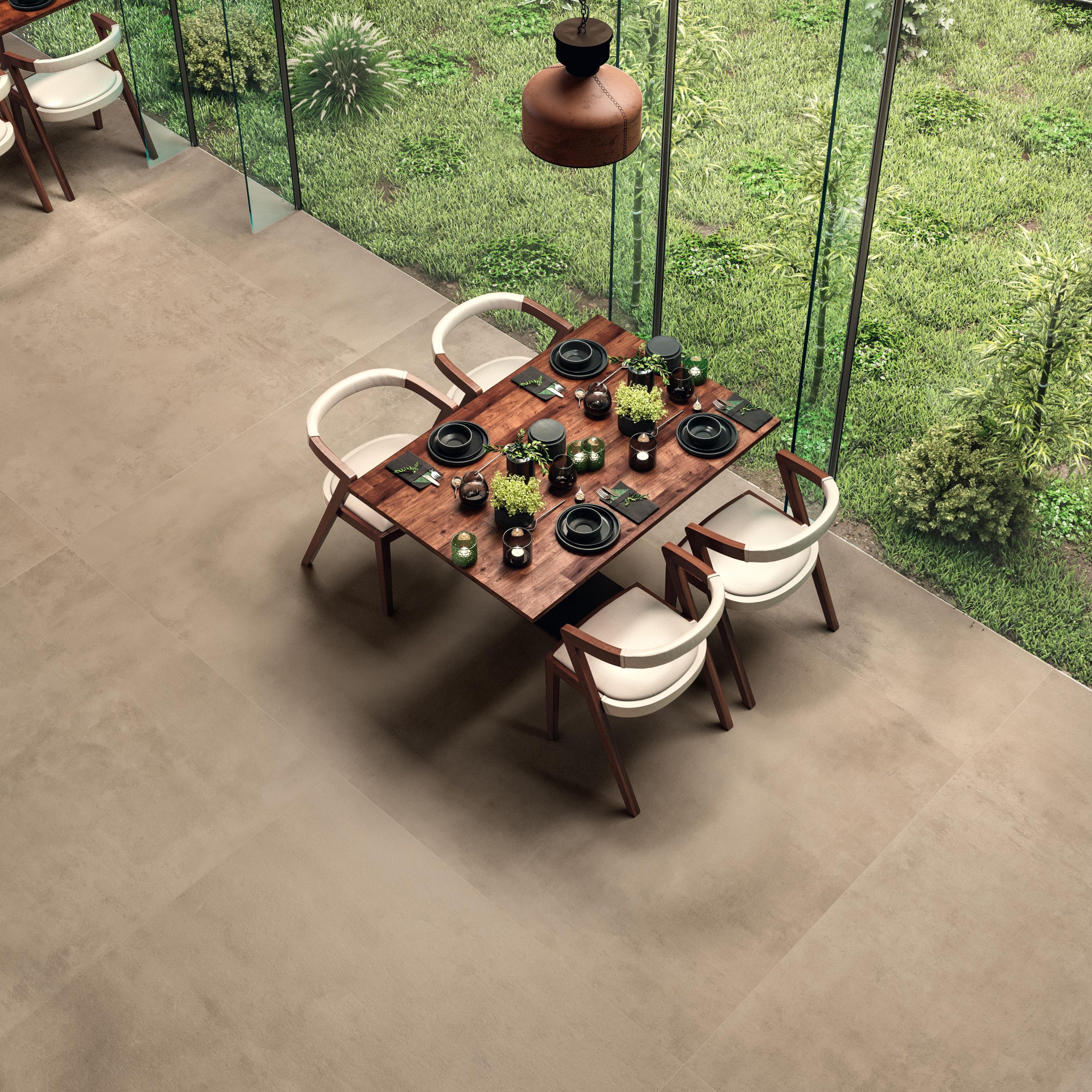 Clay color Boost Pro porcelain tile on floor in outdoor restaurant.