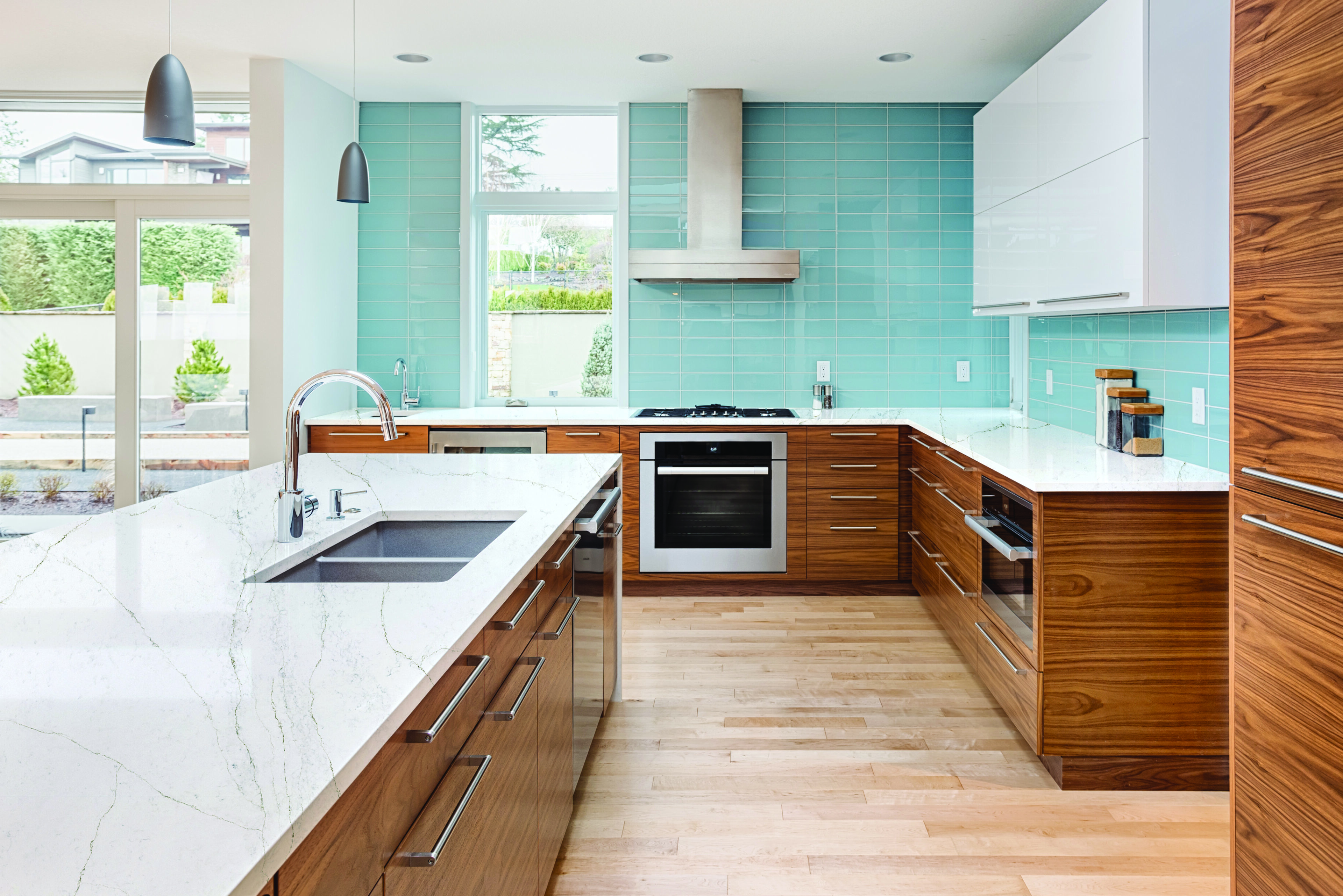 Bright kitchen with blue tile and Moritz MetroQuartz
