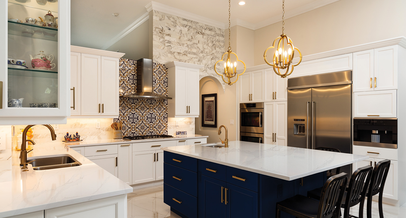 Beautiful luxury estate home kitchen with white cabinets.