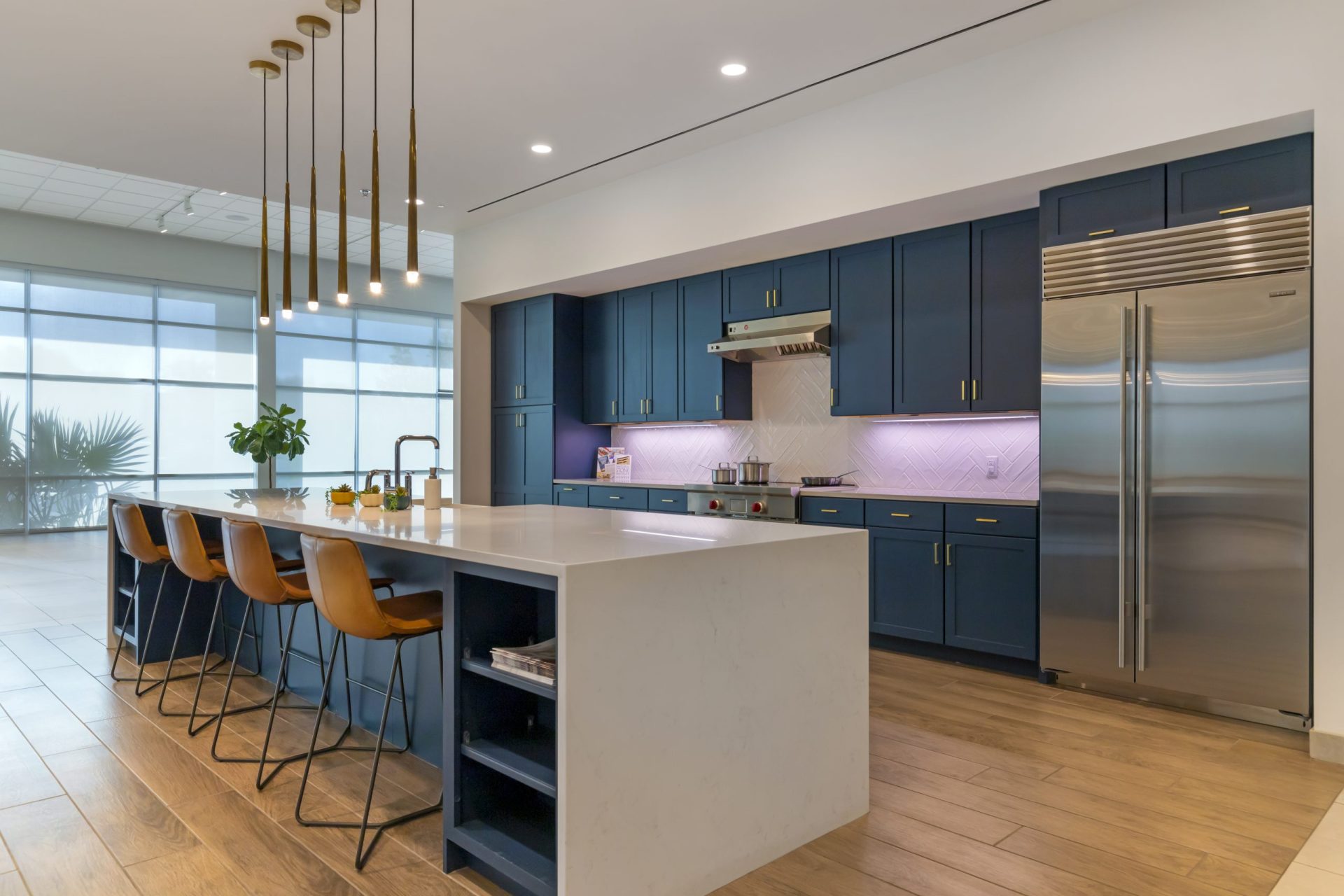 Austin showroom image with blue cabinets and island