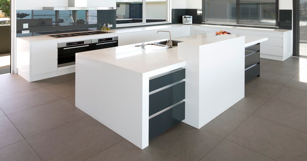 PentalQuartz Seashell featured in a modern kitchen on the countertops and island.