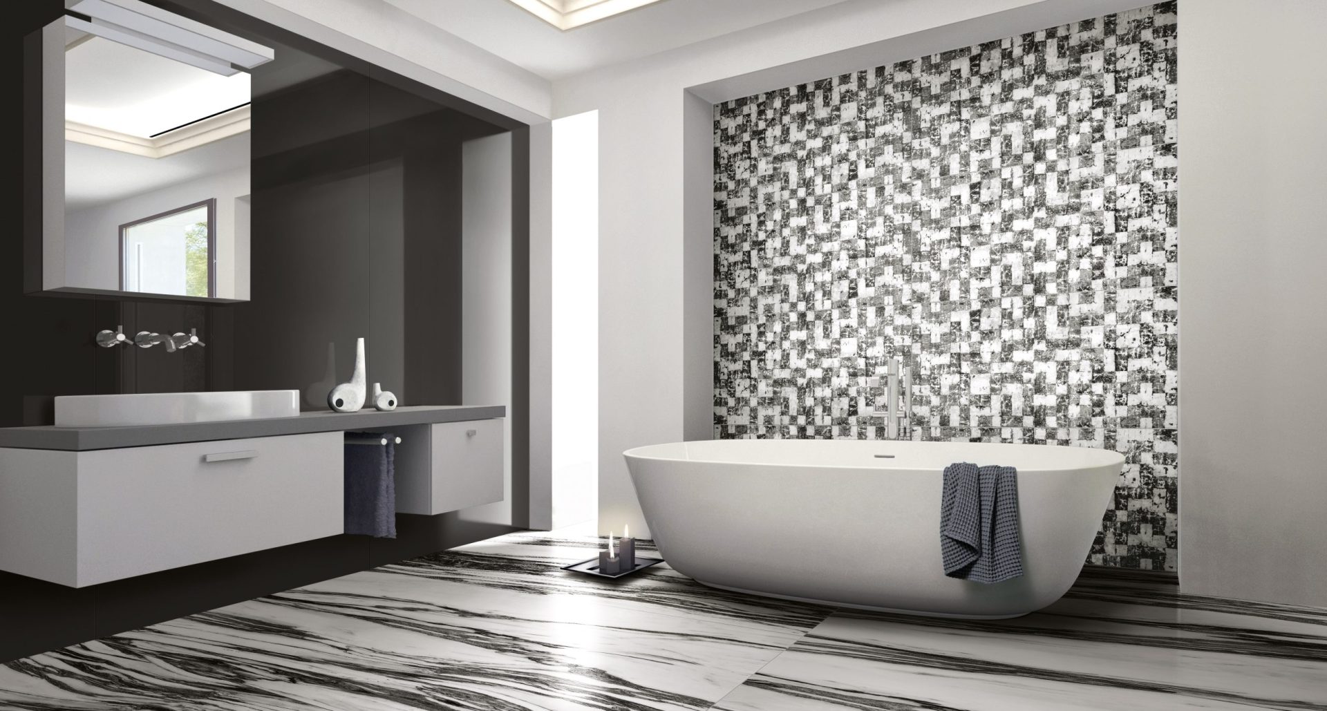 B&W wave porcelain tile on the floor in a modern bathroom and mosaic on a feature wall.