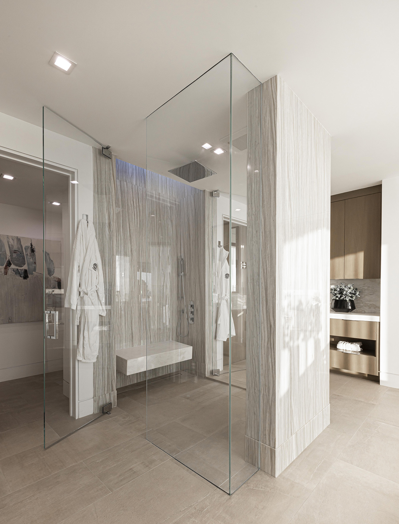 Nestos Beige marble featured in bathroom shower with porcelain tile floors