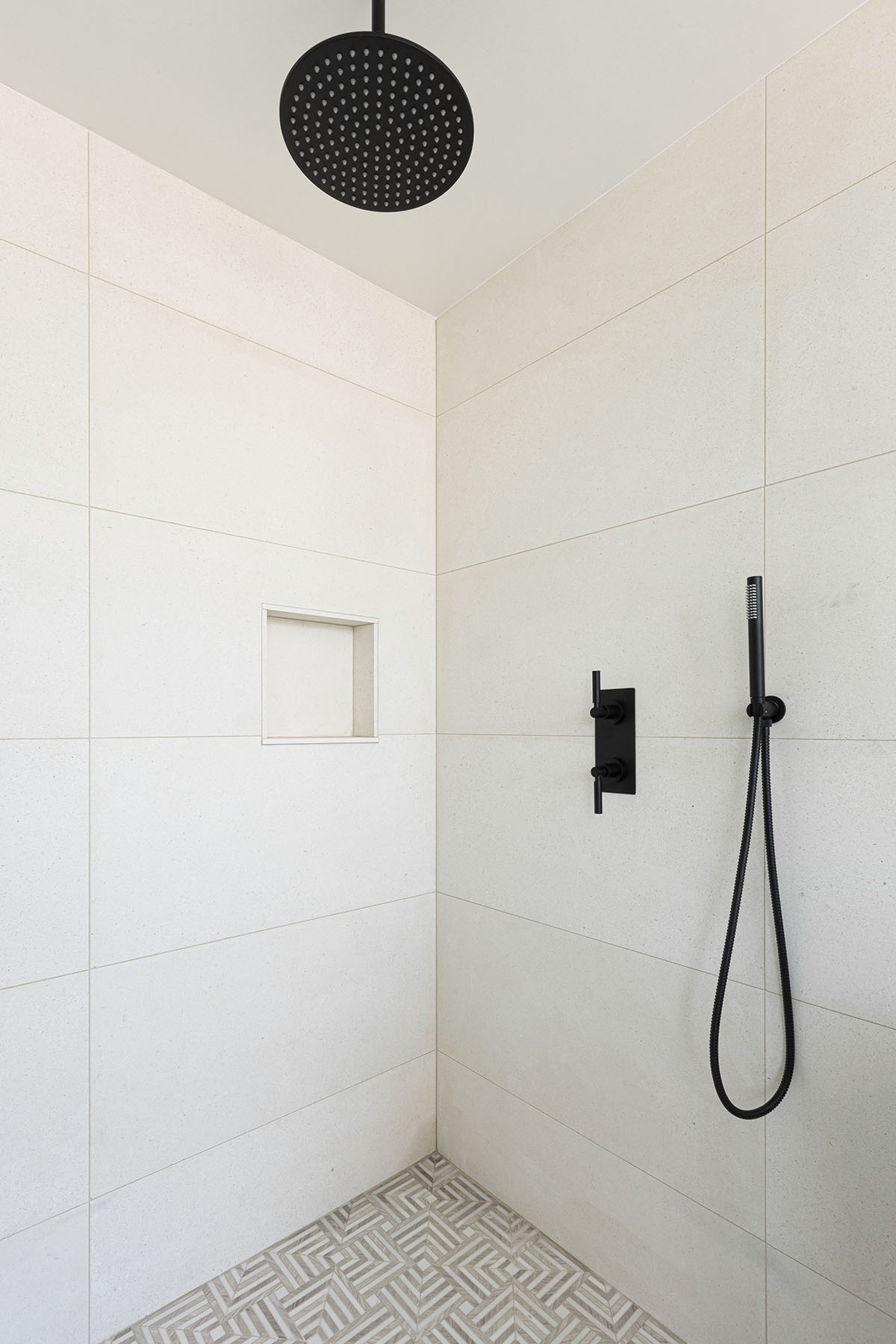 Capri limestone tiles installed in modern shower design