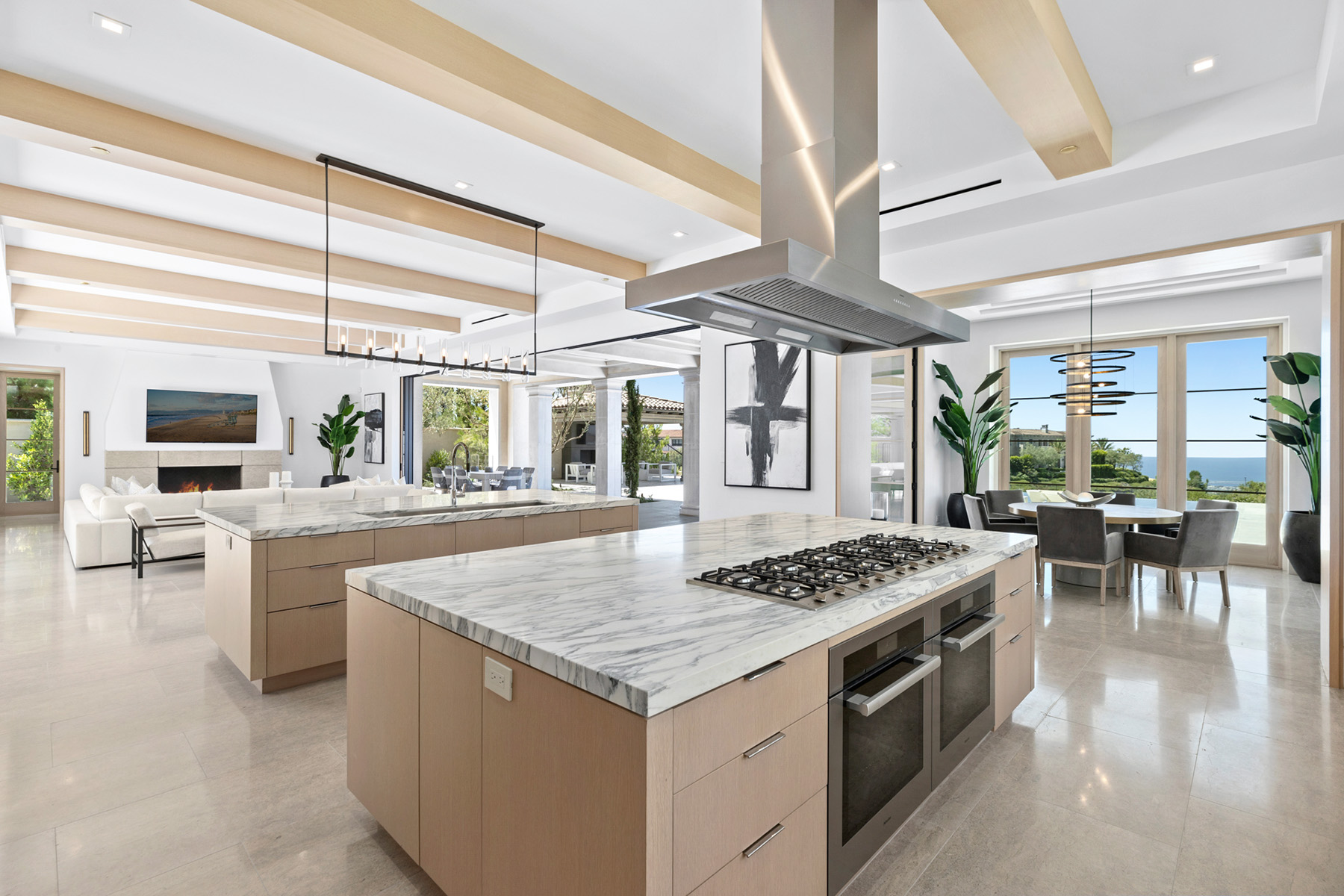 Arabescato Corchia marble installed in modern kitchen with open design