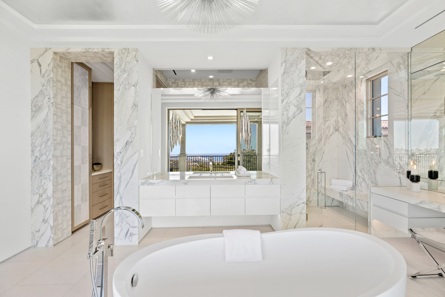 Calacatta marble installed on walls of contemporary bathroom