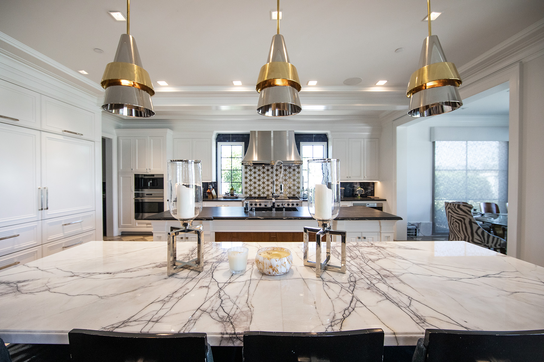 Super Lilac marble featured in modern kitchen with white cabinets