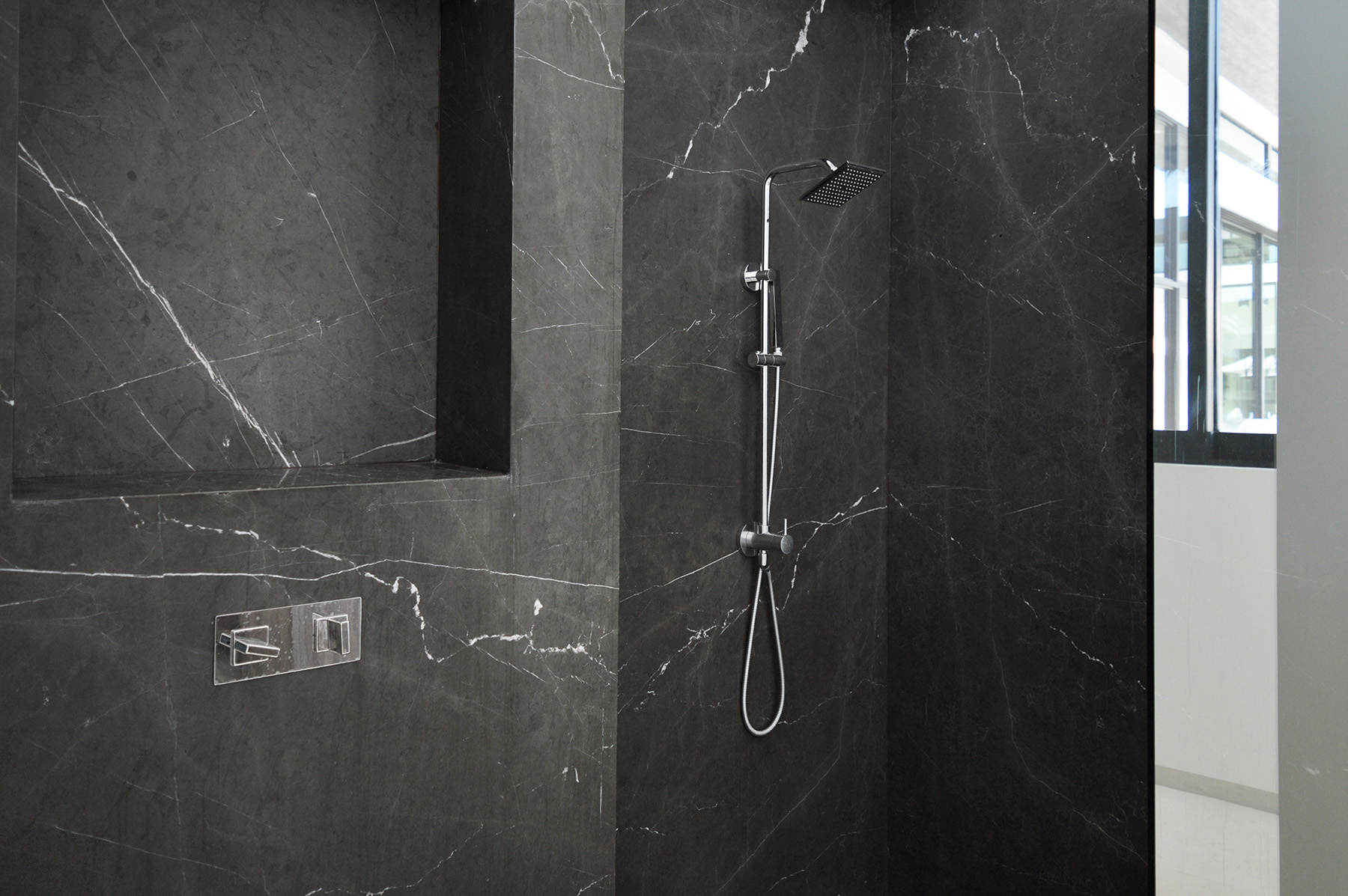 Pietra Grey marble installed in a shower close up