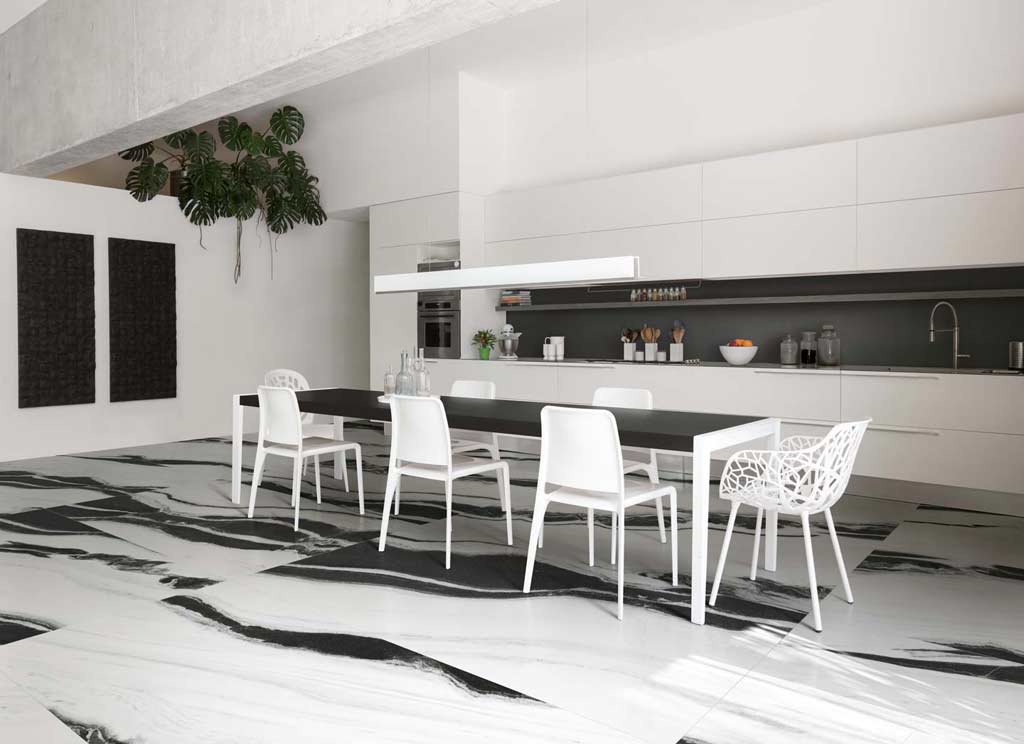 B&W wave porcelain tile on the floor in a modern kitchen.