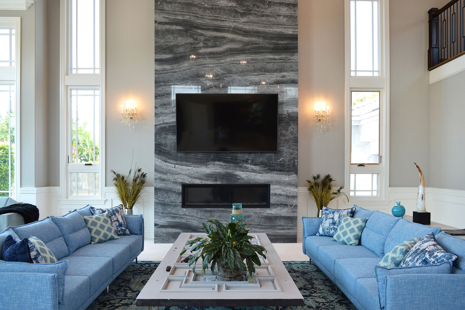 Silver Fantasy marble installed on modern living room fireplace