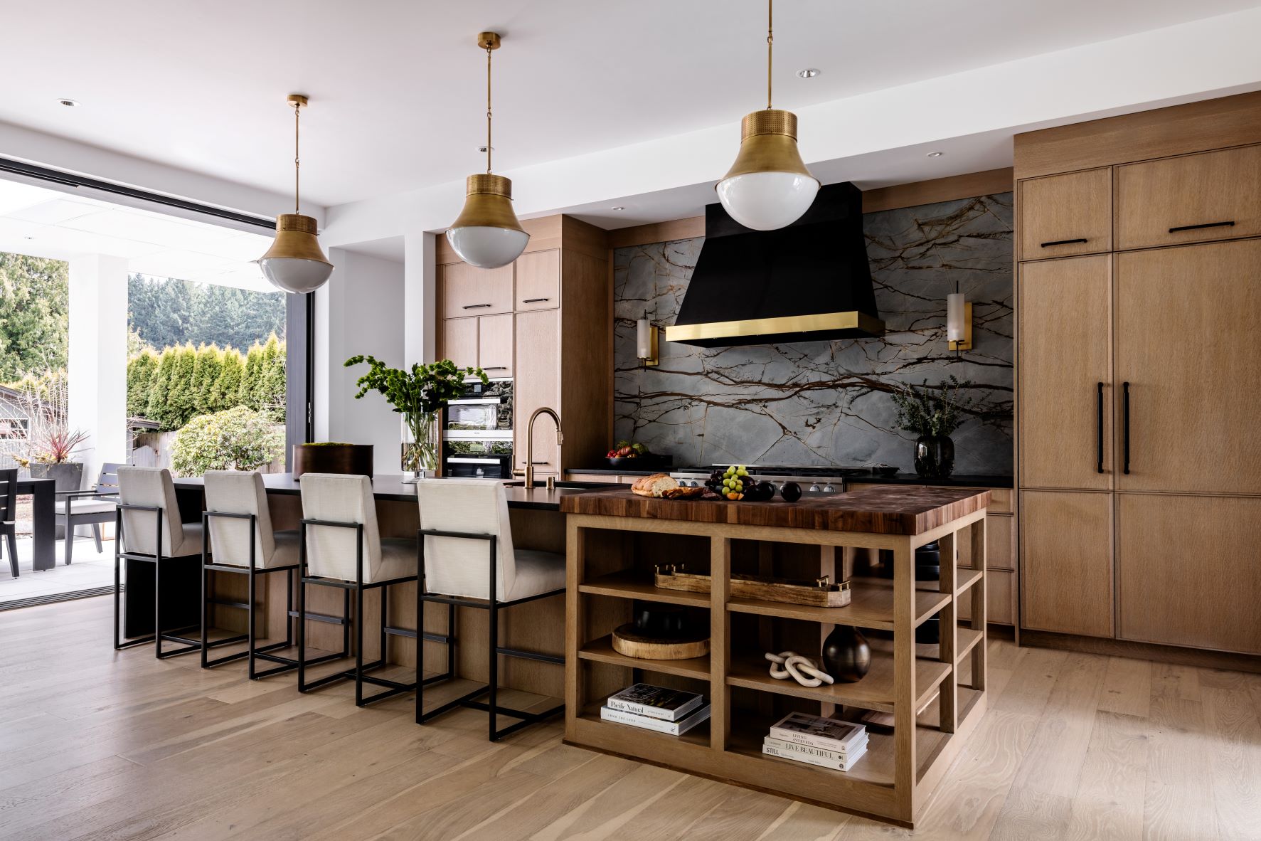 Blue Roma Quartzite backsplash in traditional yet modern kitchen.