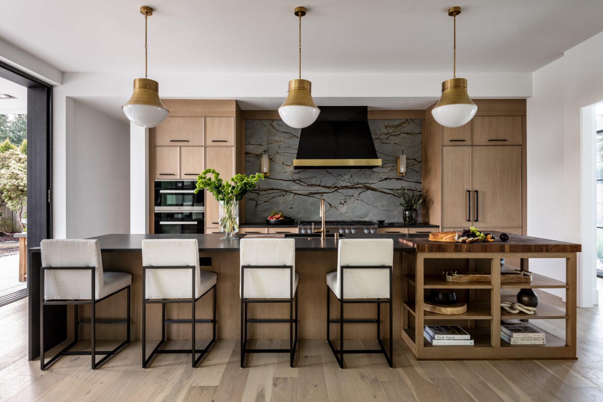 Blue Roma Quartzite backsplash in traditional yet modern kitchen.