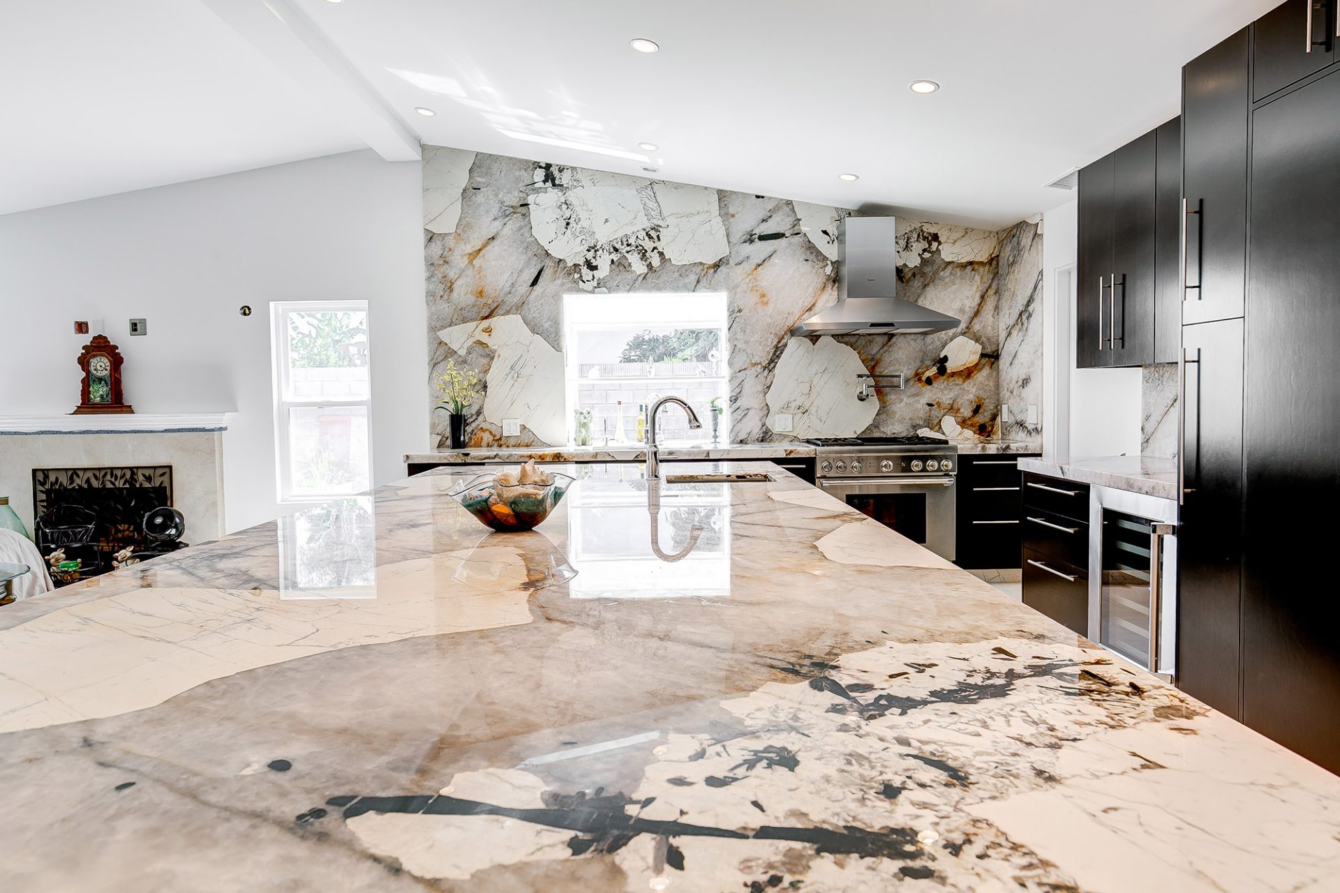 Patagonia quartzite featured on modern kitchen countertops and wall