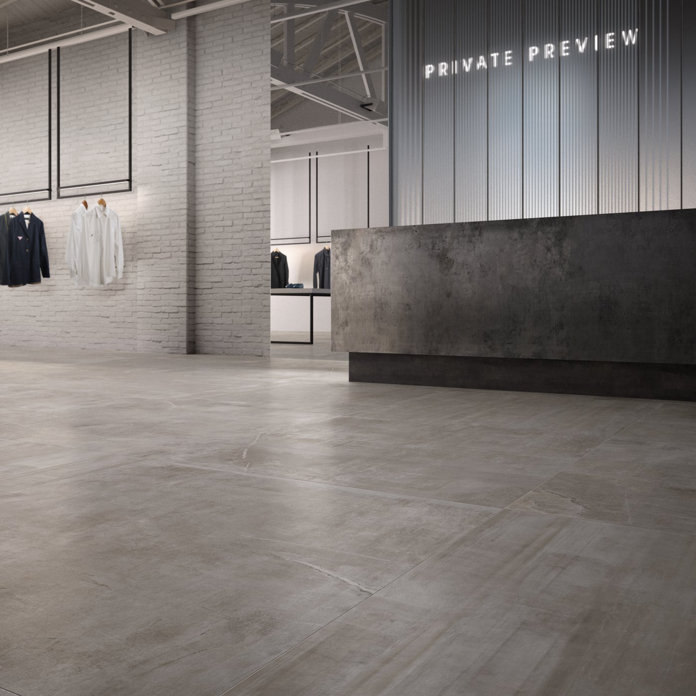 StoneOne Silver porcelain paver installed inside a retail store