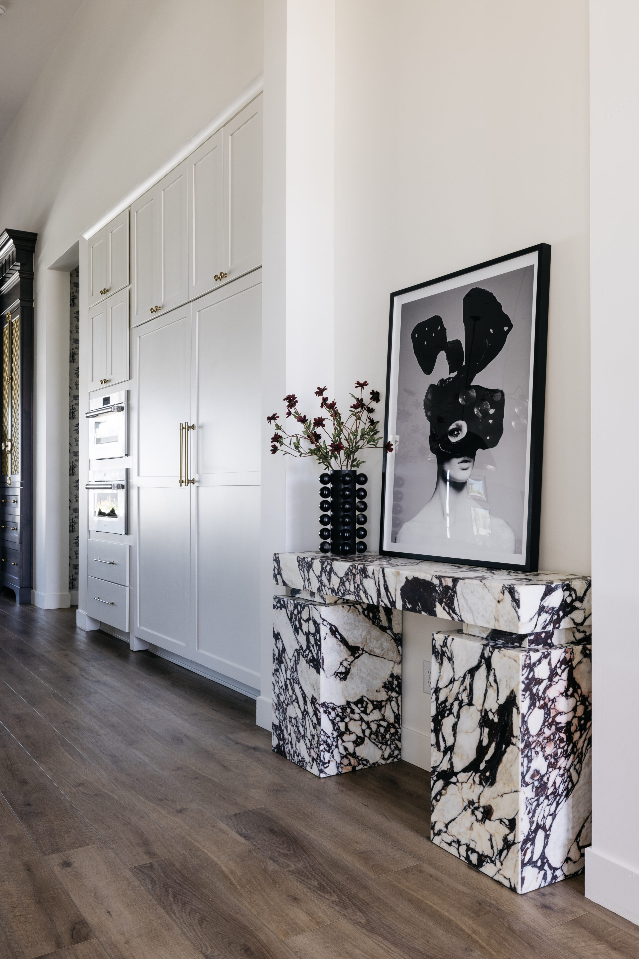 Entryway With Calacatta Viola Marble Wall