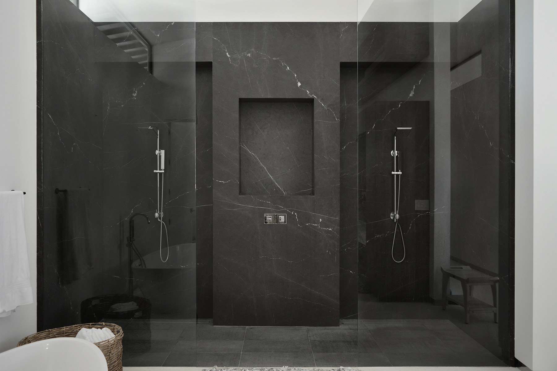 Pietra Grey marble featured on the walls of a modern shower design