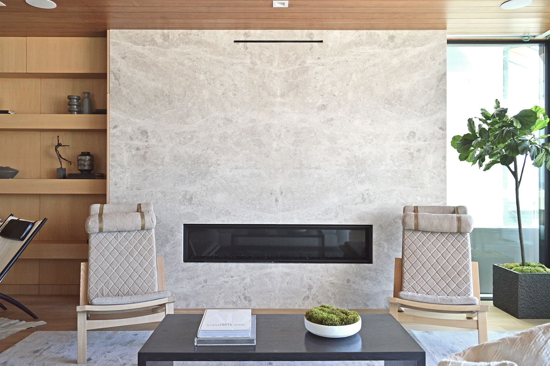 Tundra Silver marble installed on modern home fireplace
