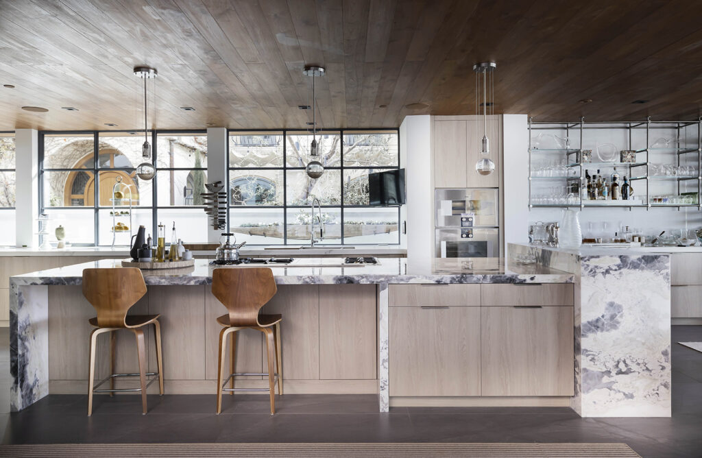 Black Oyster dolomite featured in modern kitchen with beige cabinets