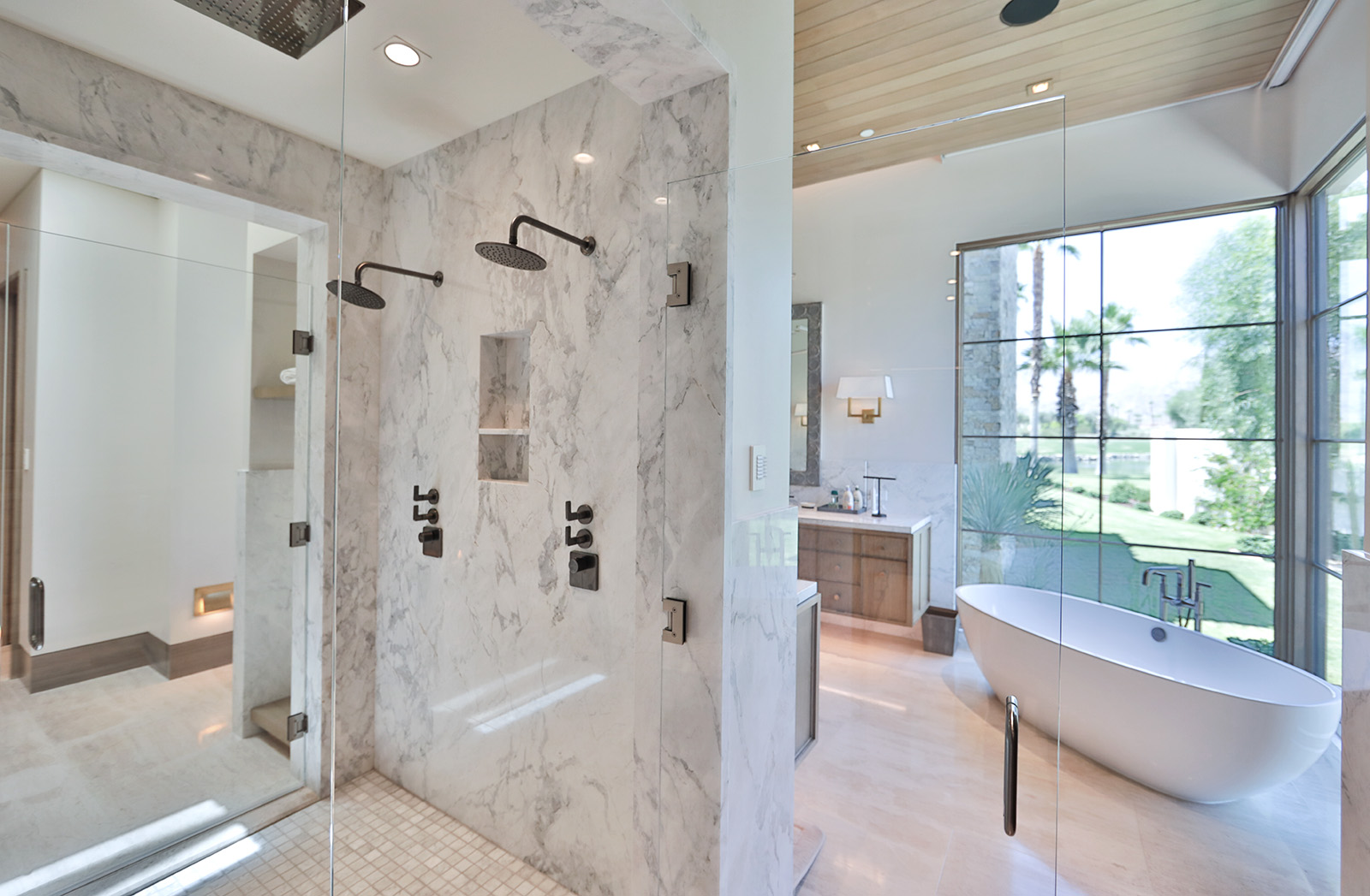 Calacatta Matarazzo installed in modern bathroom with limestone flooring