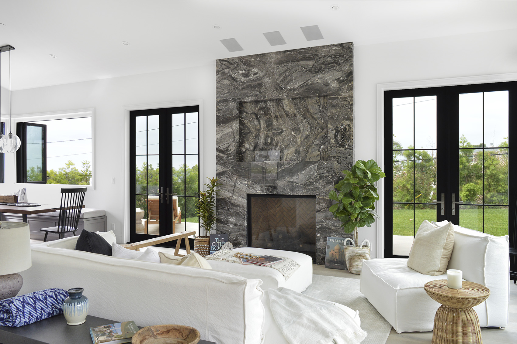 Arabescato Orobico Dark marble featured in modern living room with white furniture