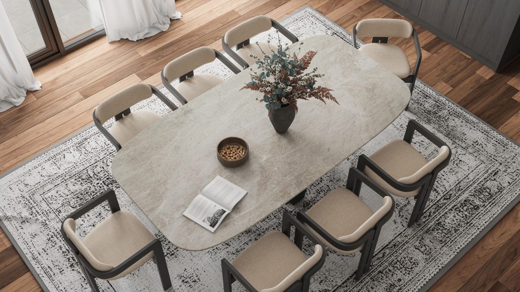 Oval Taj Mahal quartzite dining table with eight upholstered chairs
